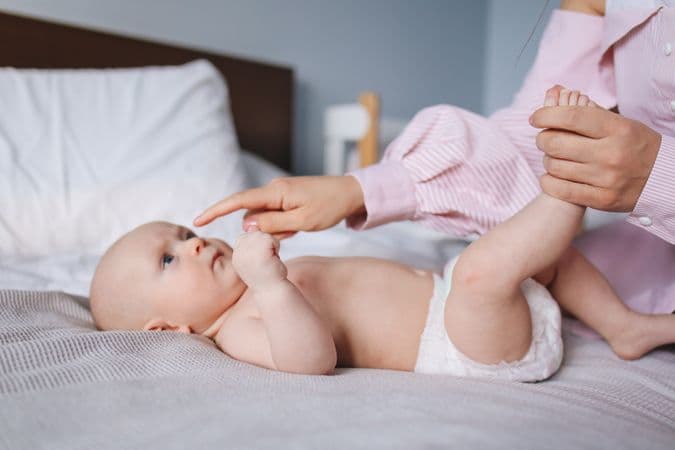 Parent holding a newborn baby